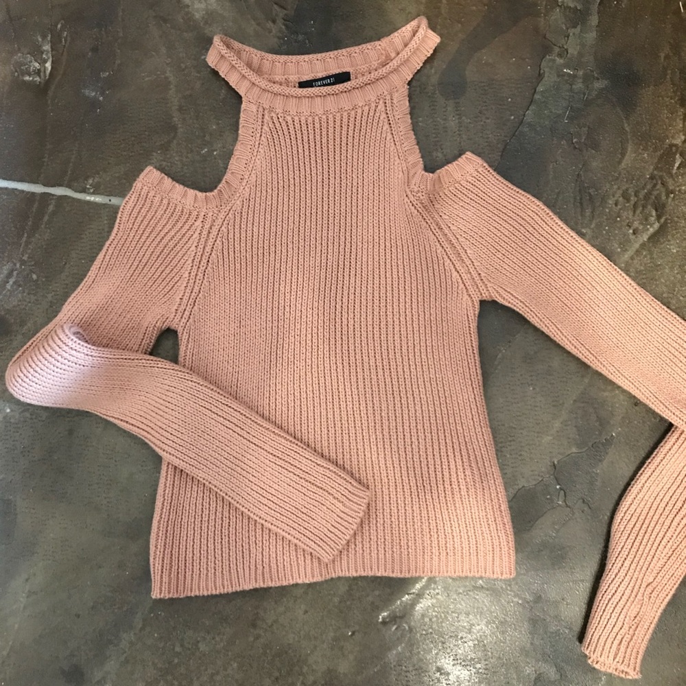 Sweater with cut outs
